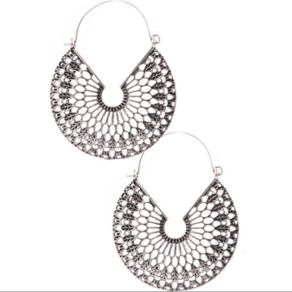 Silver bohemian earrings. Textured metal